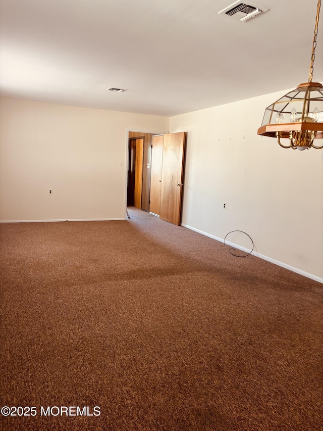 458 Jamaica Blvd, Toms River, NJ 08757 - unfurnished room featuring a chandelier and carpet floors