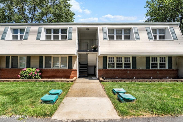 10 Haven Dr Unit B, Matawan, NJ 07747 - colonial-style house with brick siding and a front lawn