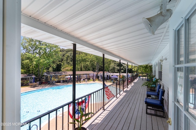 10 Haven Dr Unit B, Matawan, NJ 07747 - wooden deck with a community pool