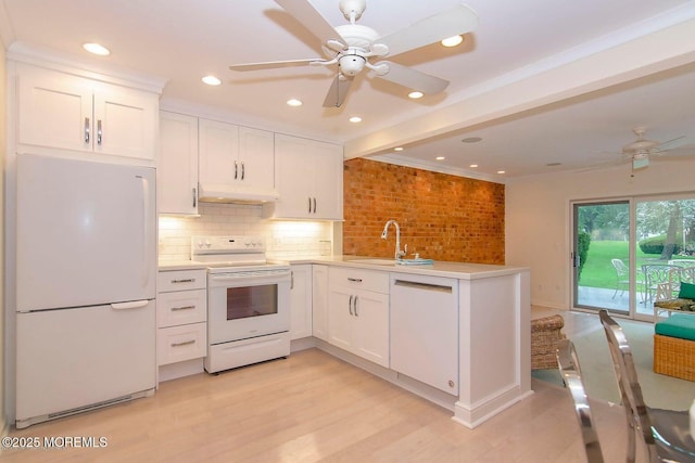 68 Linden Ct, Spring Lake Heights, NJ 07762 - kitchen featuring white appliances, ceiling fan, light wood-type flooring, a peninsula, and white cabinets