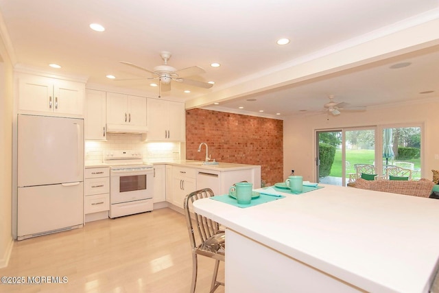 68 Linden Ct, Spring Lake Heights, NJ 07762 - kitchen with refrigerator, white range with electric stovetop, a ceiling fan, under cabinet range hood, and white cabinetry