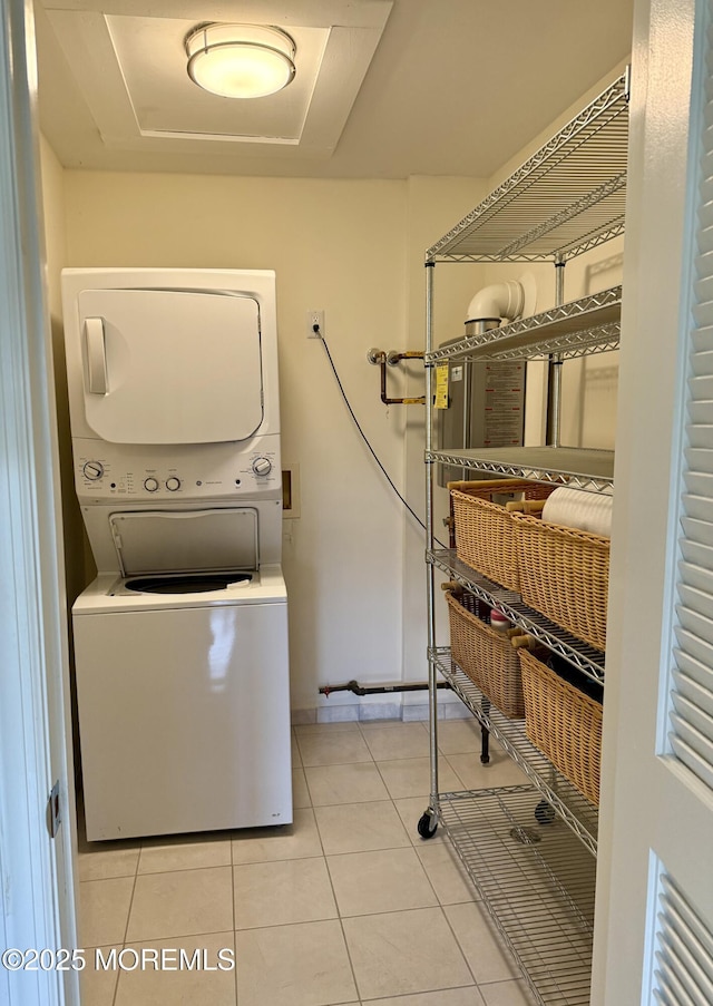 68 Linden Ct, Spring Lake Heights, NJ 07762 - washroom featuring estacked washer and dryer and light tile patterned floors