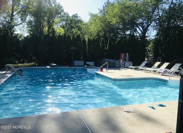 70 Desai Ct, Freehold, NJ 07728 - swimming pool with a patio area
