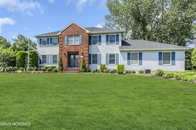 70 Desai Ct, Freehold, NJ 07728 - view of front of house with a front yard, french doors, and a shingled roof