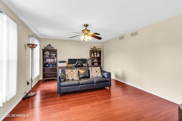 70 Desai Ct, Freehold, NJ 07728 - living room featuring a ceiling fan, wood finished floors, and an office area