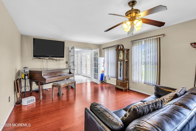 70 Desai Ct, Freehold, NJ 07728 - living area featuring a ceiling fan, wood finished floors, and french doors