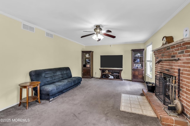 70 Desai Ct, Freehold, NJ 07728 - living area featuring carpet floors, crown molding, a ceiling fan, and a brick fireplace
