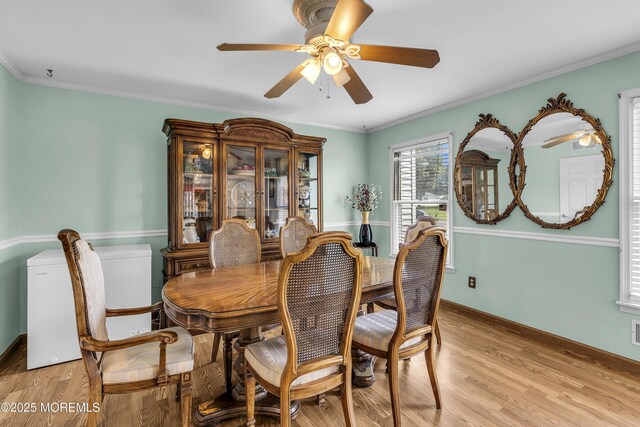 70 Desai Ct, Freehold, NJ 07728 - dining room with ceiling fan, light wood-style floors, and crown molding
