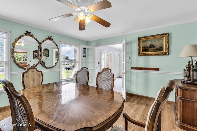 70 Desai Ct, Freehold, NJ 07728 - dining area with wood finished floors, plenty of natural light, ceiling fan, and ornamental molding
