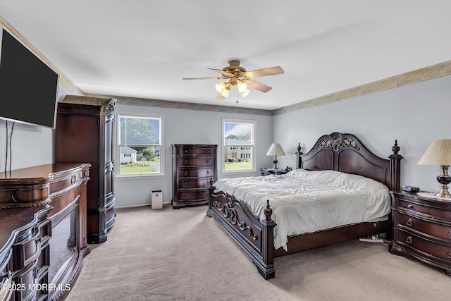 70 Desai Ct, Freehold, NJ 07728 - bedroom with light carpet and a ceiling fan
