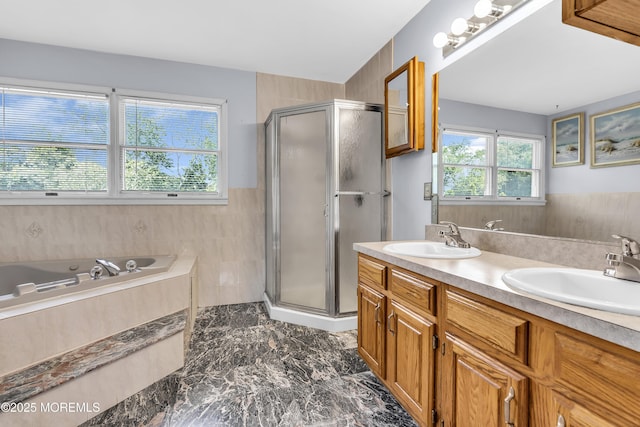 70 Desai Ct, Freehold, NJ 07728 - bathroom with a stall shower, a bath, double vanity, marble finish floors, and a wainscoted wall