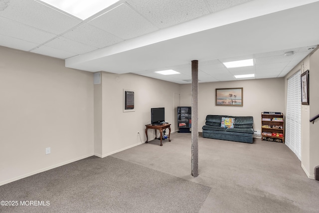 70 Desai Ct, Freehold, NJ 07728 - finished basement with a paneled ceiling, carpet floors, and a baseboard radiator
