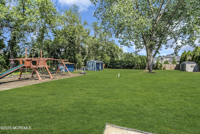 70 Desai Ct, Freehold, NJ 07728 - view of yard with a storage shed and a playground