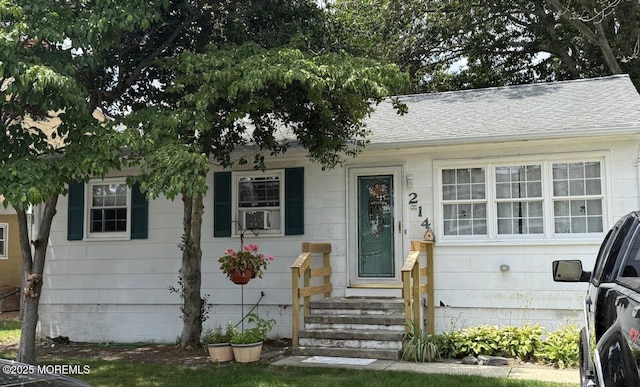 214 Crane Rd, Brick, NJ 08723 - view of front of home featuring a shingled roof and cooling unit