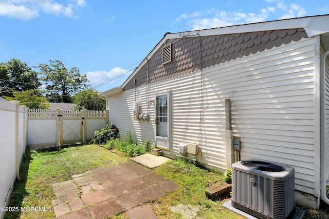 620 Pacific Ave, Beachwood, NJ 08722 - rear view of property with a fenced backyard and a gate