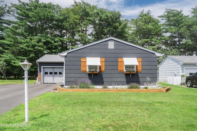 1086 Edgebrook Dr S, Toms River, NJ 08757 - view of front facade featuring a front yard, asphalt driveway, and an attached garage