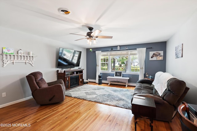 1086 Edgebrook Dr S, Toms River, NJ 08757 - living room featuring wood finished floors, ceiling fan, and baseboard heating