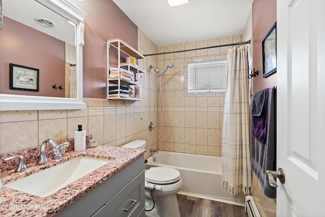 1086 Edgebrook Dr S, Toms River, NJ 08757 - bathroom featuring wood finished floors, vanity, shower / bath combination with curtain, decorative backsplash, and a baseboard heating unit