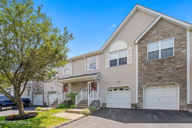 13 Jill Ct, Franklin Twp, NJ 08873 - multi unit property with stone siding, driveway, and a garage