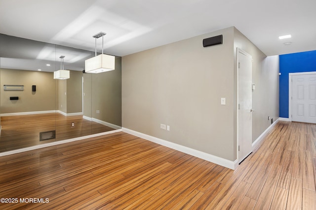 13 Jill Ct, Franklin Twp, NJ 08873 - unfurnished dining area featuring baseboards and light wood finished floors