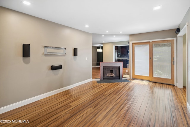 13 Jill Ct, Franklin Twp, NJ 08873 - unfurnished living room featuring wood finished floors, a fireplace with flush hearth, and recessed lighting