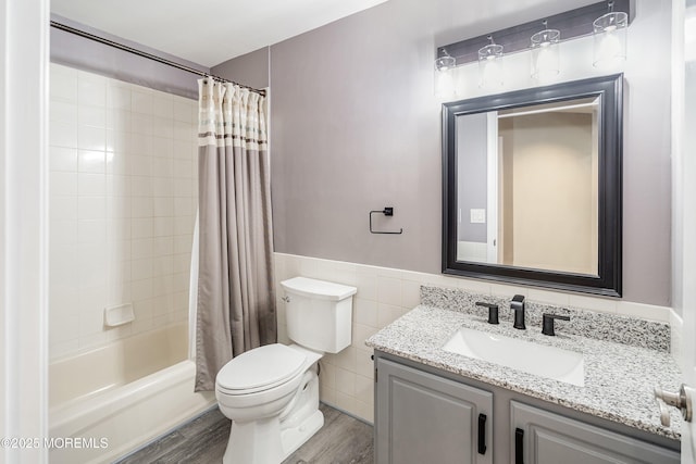 13 Jill Ct, Franklin Twp, NJ 08873 - bathroom with vanity, wood finished floors, shower / bath combo, wainscoting, and tile walls