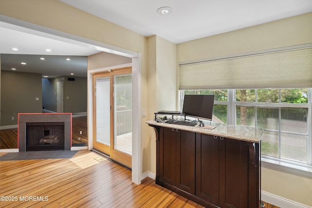 13 Jill Ct, Franklin Twp, NJ 08873 - home office with healthy amount of natural light, light wood-style flooring, a fireplace with flush hearth, and recessed lighting