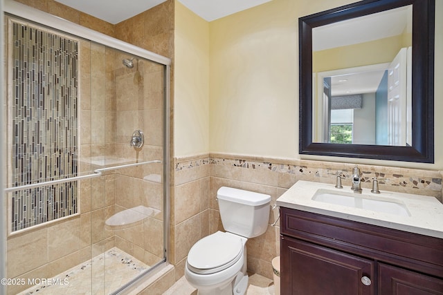 13 Jill Ct, Franklin Twp, NJ 08873 - bathroom with tile walls, vanity, a shower stall, and a wainscoted wall