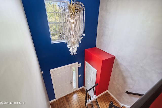 13 Jill Ct, Franklin Twp, NJ 08873 - entrance foyer featuring a chandelier, wood finished floors, and a towering ceiling