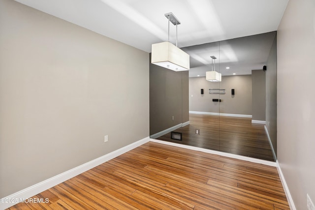 13 Jill Ct, Franklin Twp, NJ 08873 - unfurnished dining area with wood-type flooring and recessed lighting
