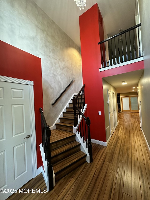 13 Jill Ct, Franklin Twp, NJ 08873 - stairs featuring wood finished floors and a high ceiling