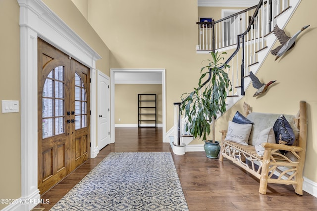 10 Biscayne Ct, Jackson, NJ 08527 - foyer entrance featuring stairway, a towering ceiling, crown molding, dark wood finished floors, and french doors