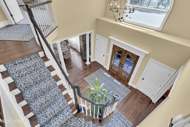 10 Biscayne Ct, Jackson, NJ 08527 - entrance foyer featuring a high ceiling, a chandelier, wood finished floors, stairs, and decorative columns