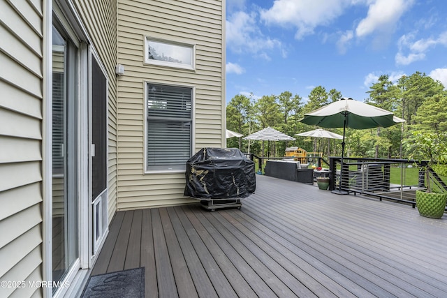 10 Biscayne Ct, Jackson, NJ 08527 - wooden deck featuring area for grilling and outdoor dining space
