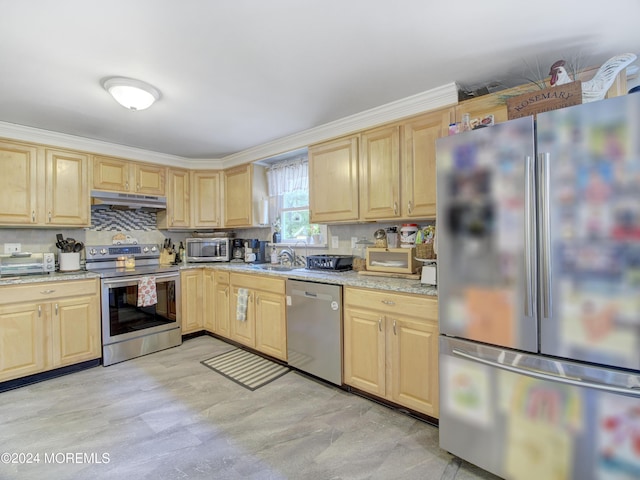 518 Basso St, Jackson, NJ 08527 - kitchen featuring stainless steel appliances, light brown cabinetry, under cabinet range hood, crown molding, and backsplash