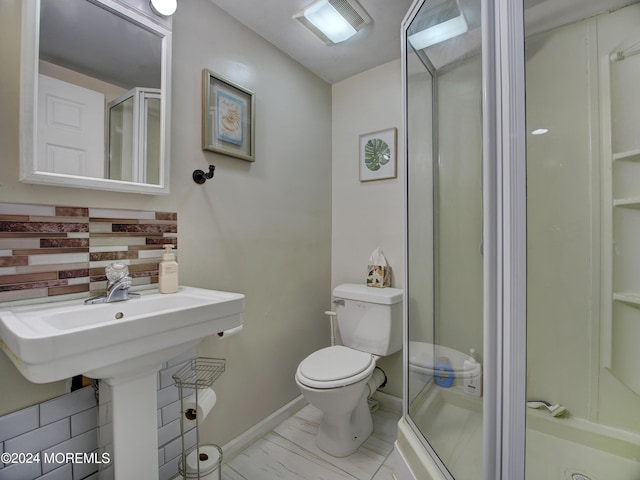 518 Basso St, Jackson, NJ 08527 - bathroom with a stall shower and marble look tile flooring