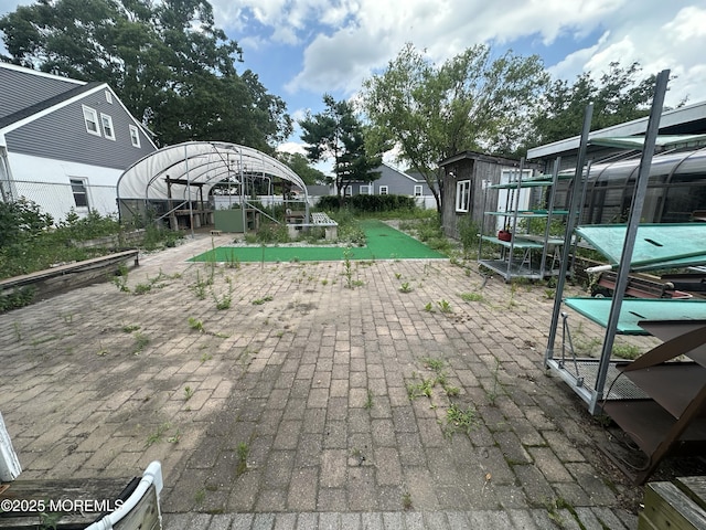 570 Mantoloking Rd, Brick, NJ 08723 - view of home's community featuring an outdoor structure and a greenhouse