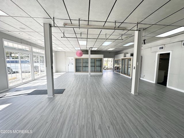 570 Mantoloking Rd, Brick, NJ 08723 - exercise area featuring wood finished floors and baseboards