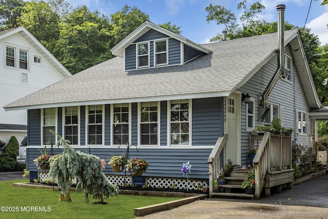 614 Bay Blvd, Bayville, NJ 08721 - view of front facade with roof with shingles and covered porch