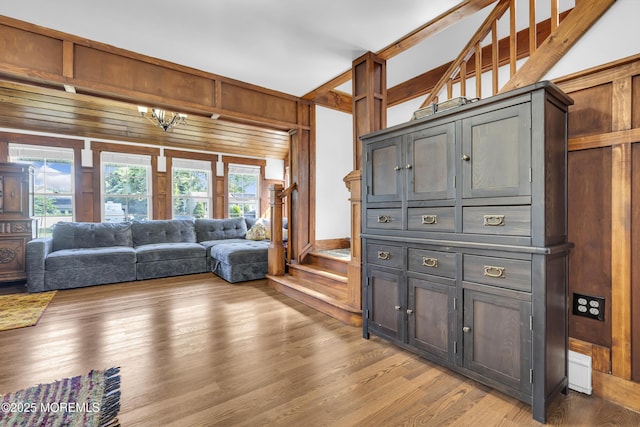 614 Bay Blvd, Bayville, NJ 08721 - living room featuring light wood-style flooring and wood walls