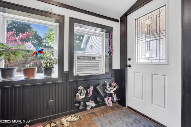 614 Bay Blvd, Bayville, NJ 08721 - foyer featuring healthy amount of natural light, wainscoting, wood finished floors, and cooling unit