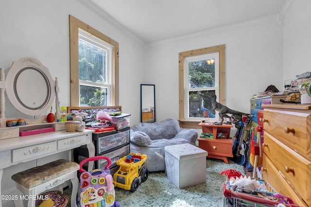 614 Bay Blvd, Bayville, NJ 08721 - playroom featuring crown molding, plenty of natural light, and carpet flooring