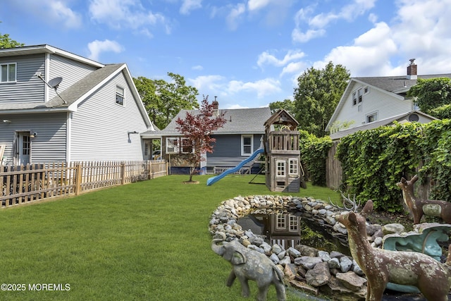 614 Bay Blvd, Bayville, NJ 08721 - fenced backyard featuring a playground