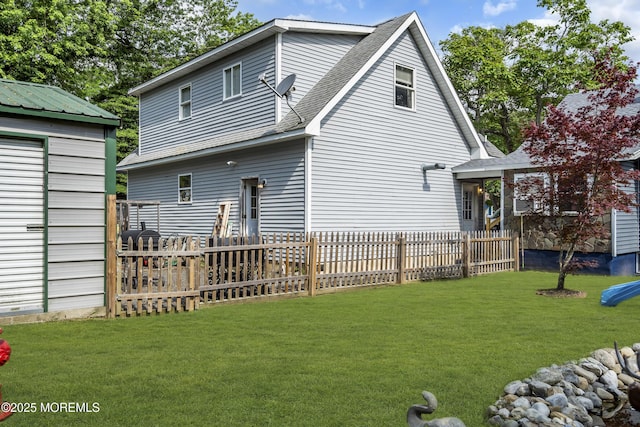 614 Bay Blvd, Bayville, NJ 08721 - rear view of property featuring a shingled roof and an outbuilding