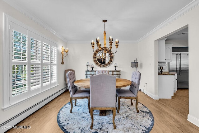 101 Taft Ct, Brick, NJ 08724 - dining space with a baseboard radiator, a chandelier, ornamental molding, and light wood-style floors