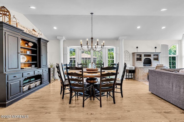 101 Taft Ct, Brick, NJ 08724 - dining room with decorative columns, light wood-style flooring, a chandelier, vaulted ceiling, and recessed lighting