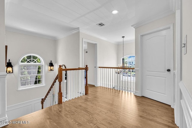 101 Taft Ct, Brick, NJ 08724 - corridor featuring an upstairs landing, a chandelier, wood finished floors, and ornamental molding
