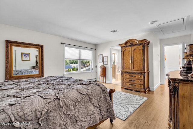 101 Taft Ct, Brick, NJ 08724 - bedroom featuring attic access, light wood-type flooring, and ensuite bathroom