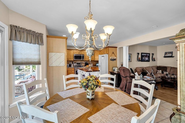 101 Taft Ct, Brick, NJ 08724 - dining room featuring a chandelier and ornate columns