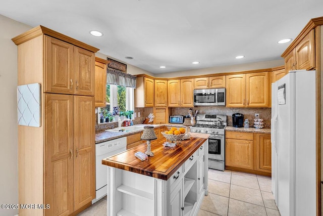 101 Taft Ct, Brick, NJ 08724 - kitchen with appliances with stainless steel finishes, open shelves, butcher block countertops, backsplash, and recessed lighting
